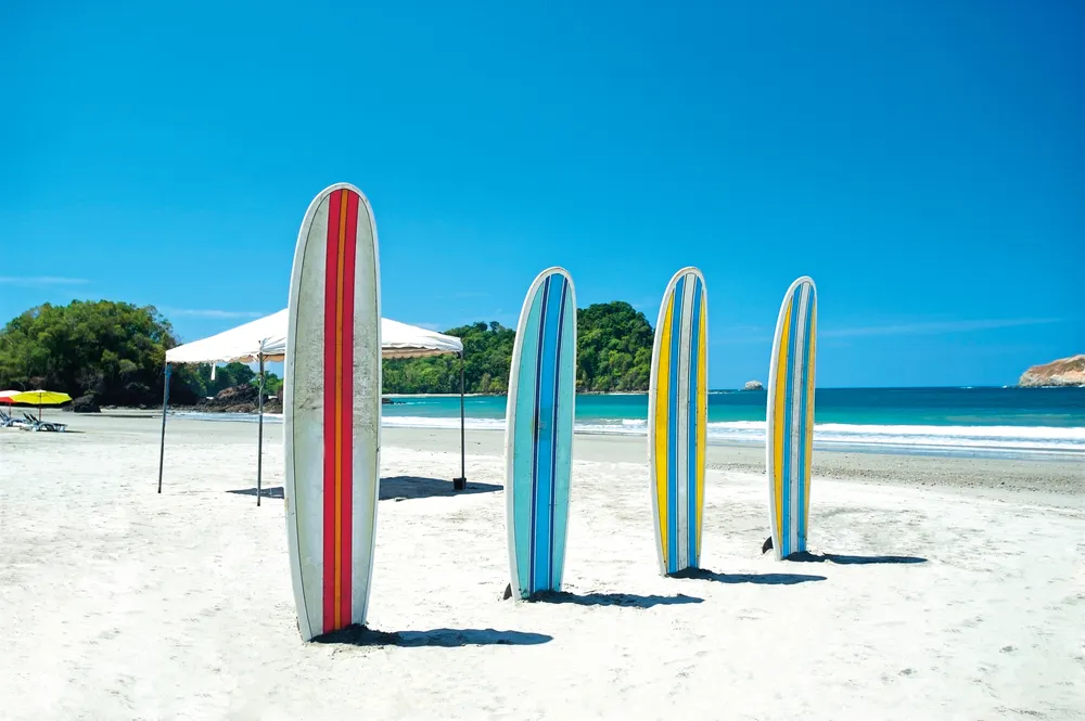 Des planches de surf à Playa Jacó. 	©iStockphoto / Jodi Jacobson